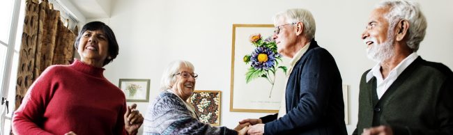 senior-friends-dancing-together-at-home-2023-11-27-05-11-56-utc