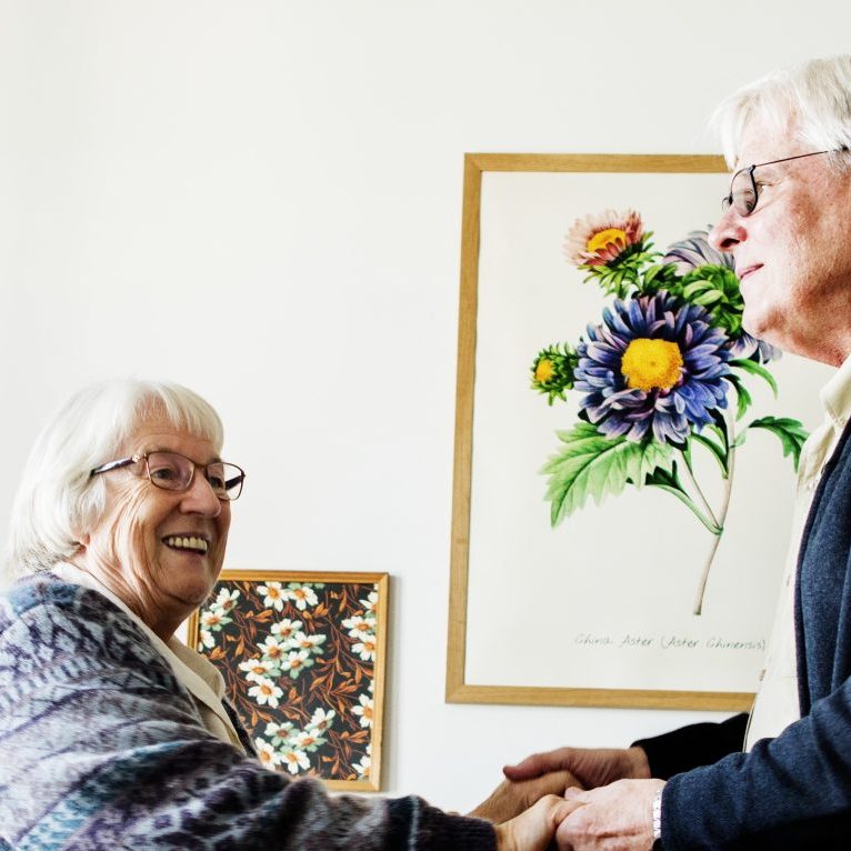 senior-friends-dancing-together-at-home-2023-11-27-05-11-56-utc