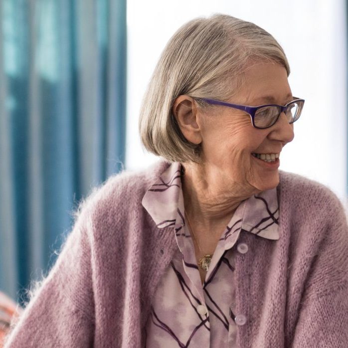 smiling-female-doctor-looking-at-senior-woman-stan-2023-11-27-04-54-10-utc