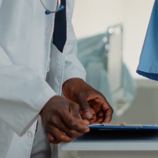 woman-working-as-nurse-using-laptop-to-help-doctor-2022-07-056-13-41-35-utc